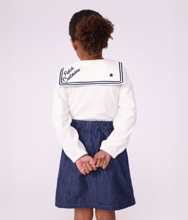 Falda corta de tejido denim liso con estampado de estrellas azul