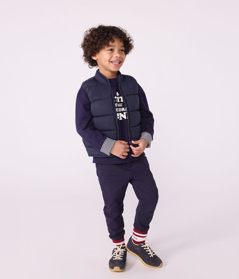 Plum&iacute;fero infantil sin mangas bicolor reversible azul/amarillo