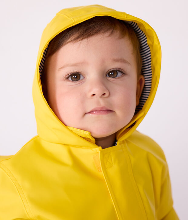 Chubasquero emblem&aacute;tico de beb&eacute; amarillo