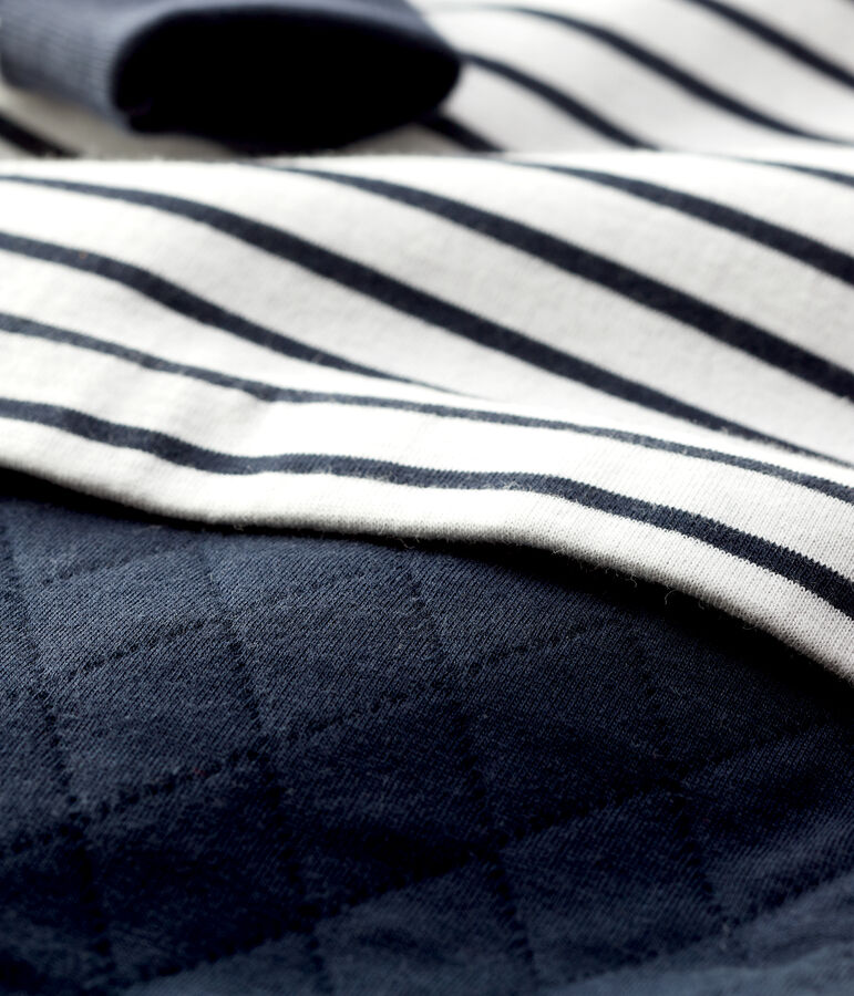 Mono emblem&aacute;tico de beb&eacute;. blanco/azul