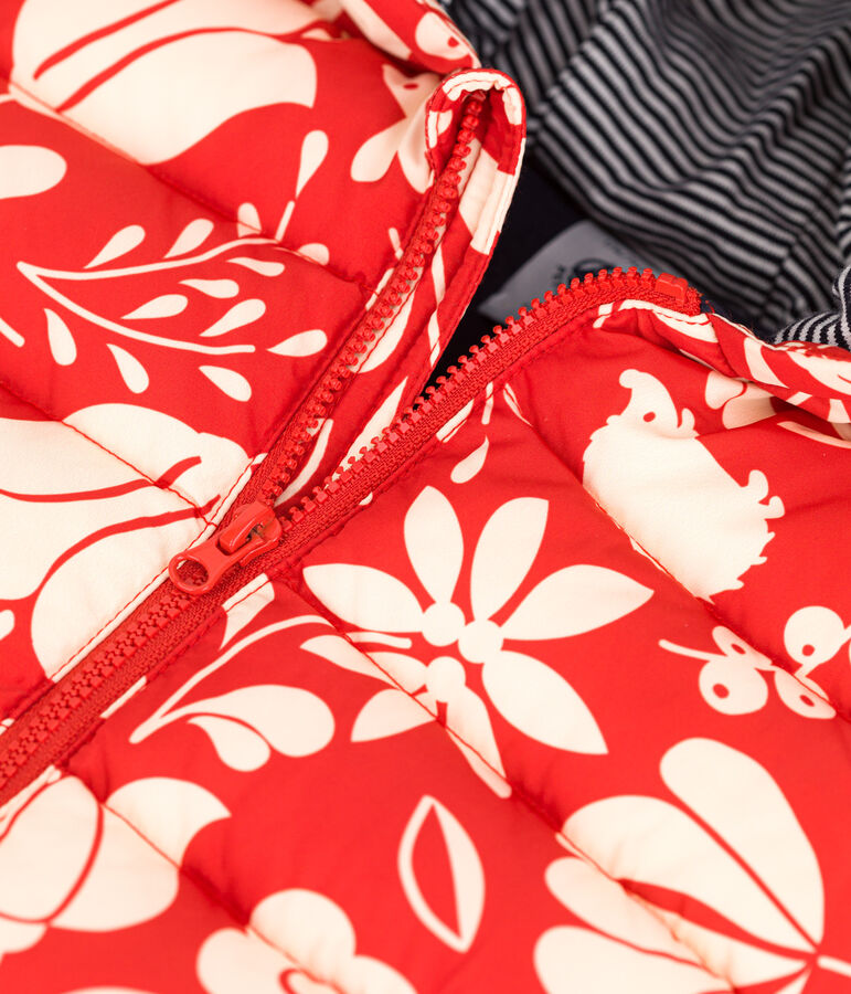 Plum&iacute;fero reciclado estampado para beb&eacute; naranja/crudo