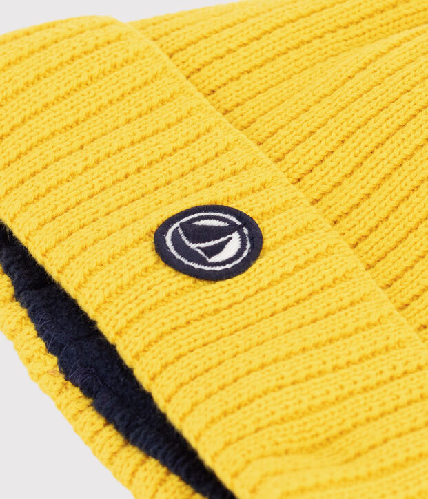 Gorro infantil de punto tricotado con forro polar amarillo