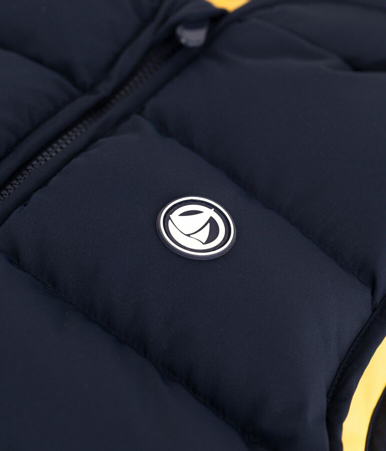 Plum&iacute;fero infantil sin mangas bicolor reversible azul/amarillo