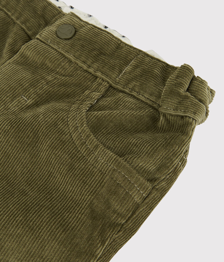 Pantal&oacute;n de terciopelo de beb&eacute;. verde