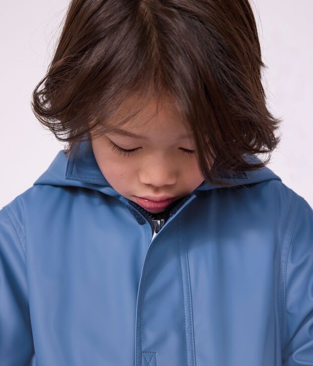 Chubasquero ic&oacute;nico liso infantil azul