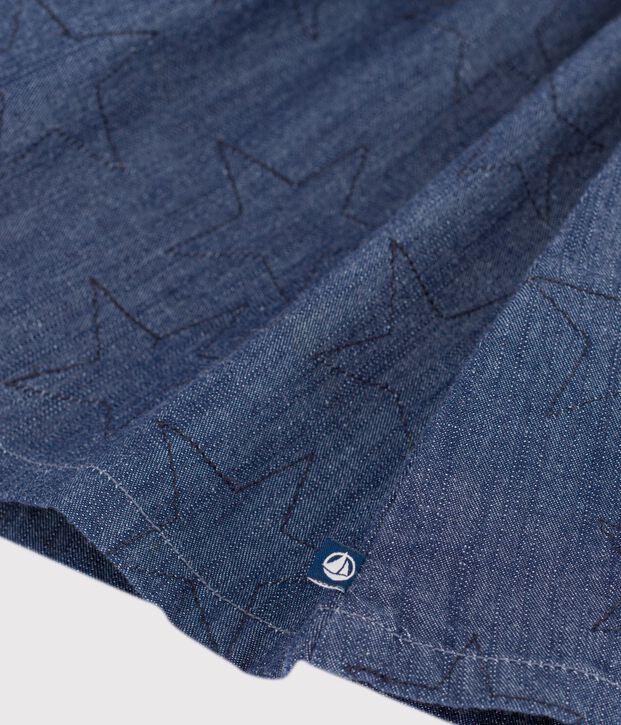 Falda corta de tejido denim liso con estampado de estrellas azul