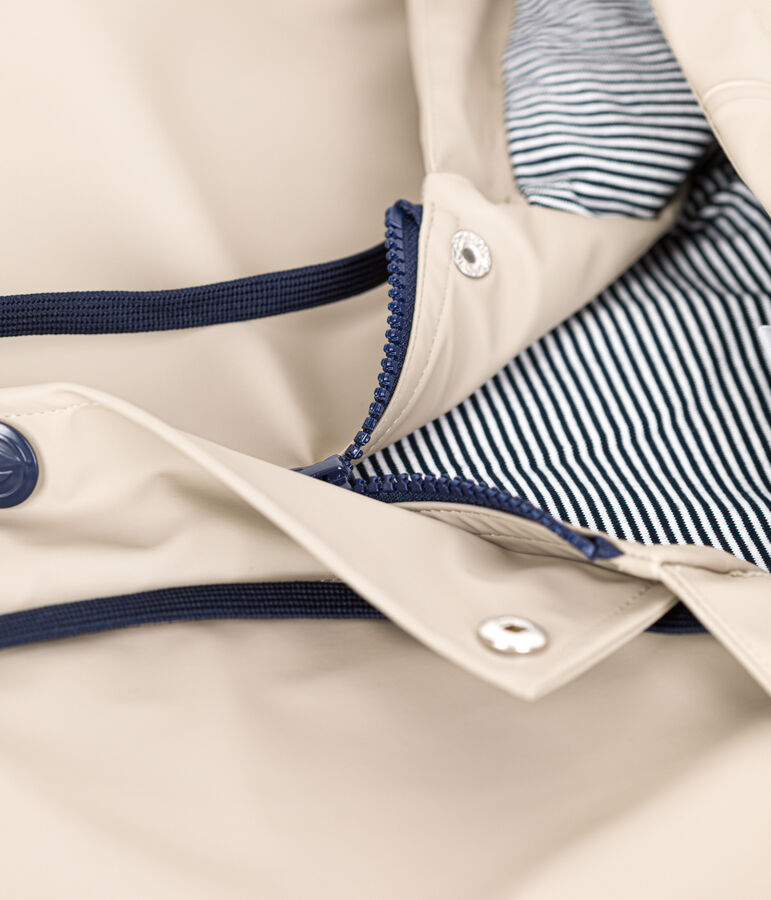 Chubasquero emblem&aacute;tico unisex beige