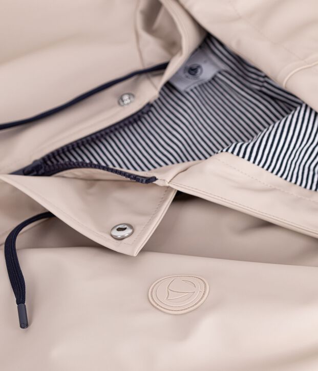 Chubasquero ic&oacute;nico unisex crudo