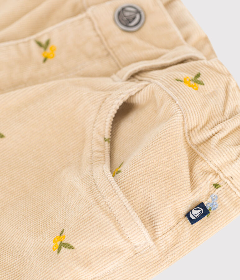 Pantal&oacute;n infantil de pana con estampado beige/multicolor