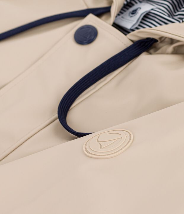 Chubasquero ic&oacute;nico unisex beige