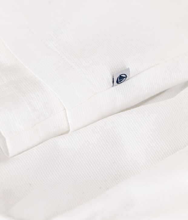 Vestido y pololo de piqu&eacute; de algod&oacute;n para beb&eacute; blanco