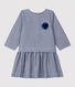 Vestido de tela de bebé.