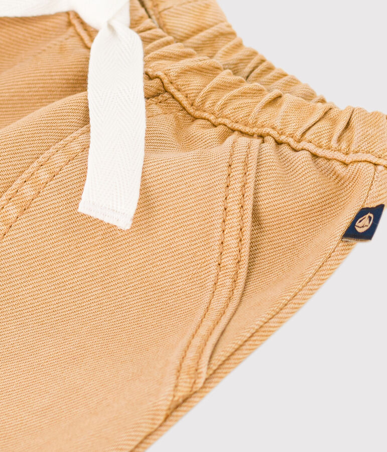 Pantal&oacute;n de tejido vaquero de color para beb&eacute; beige