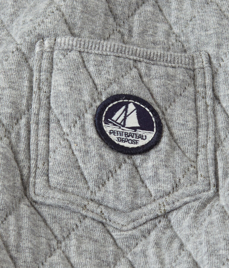 Peto beb&eacute; ni&ntilde;o en t&uacute;bico acolchado. gris