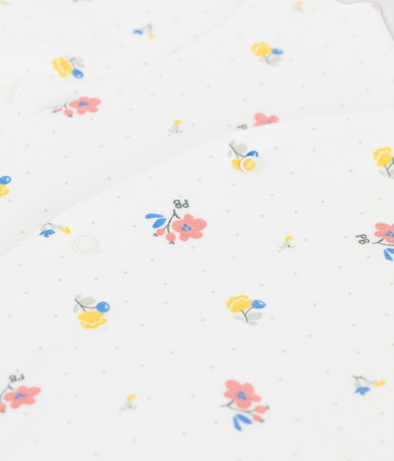 Mono largo de beb&eacute; con estampado en tejido t&uacute;bico ecol&oacute;gico blanco/rosa