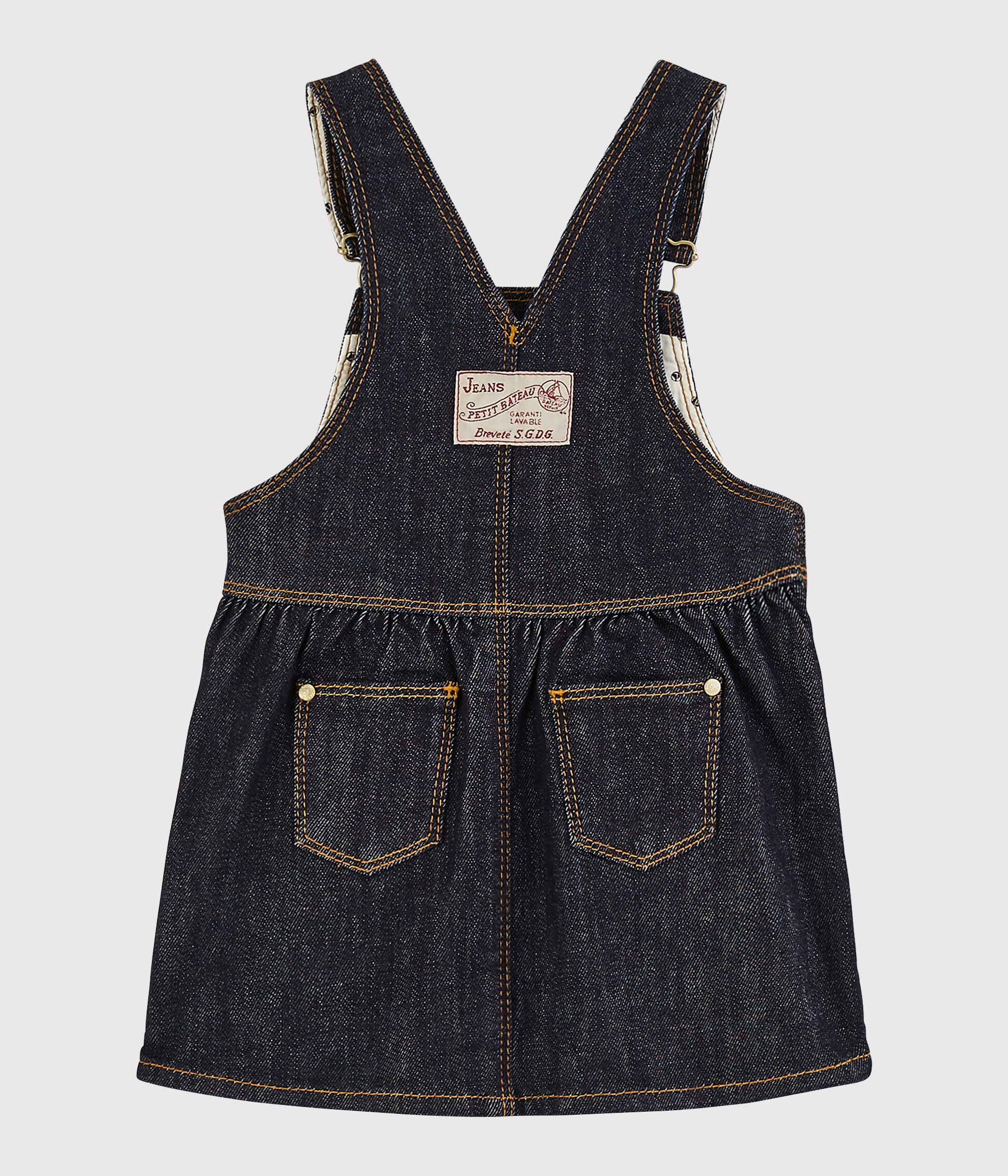 Vestido peto vaquero sale niña